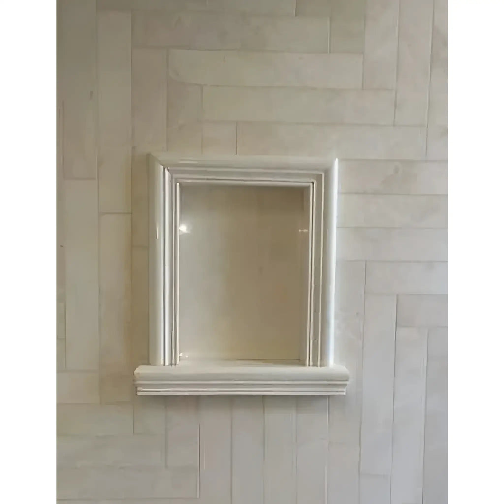 Hand Made Marble Shampoo Niche featuring a recessed wall niche with decorative trim