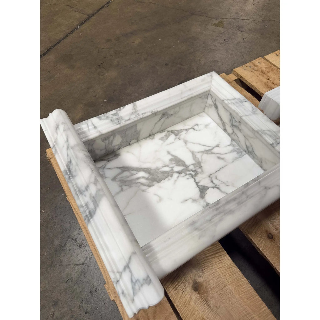 Rectangular white marble shower pan with grey veining and fluted edge for Handmade Marble Shampoo Niche