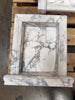 White marble fireplace surround with grey veining for Hand Made Marble Shampoo Niche