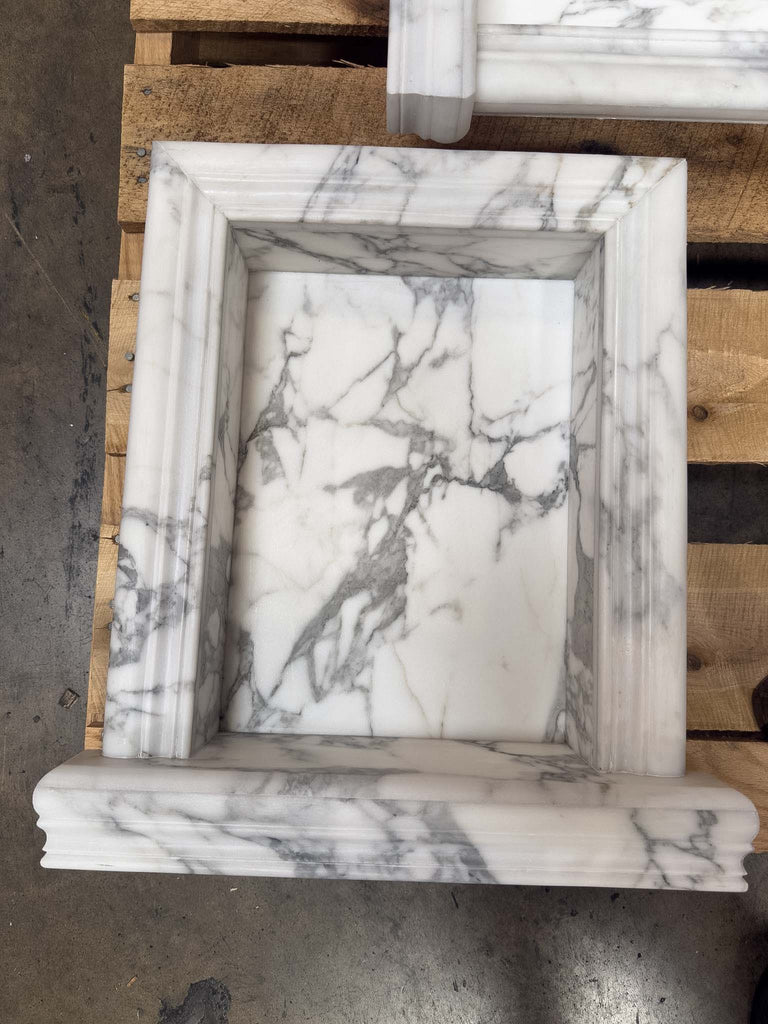 White marble fireplace surround with grey veining for Hand Made Marble Shampoo Niche