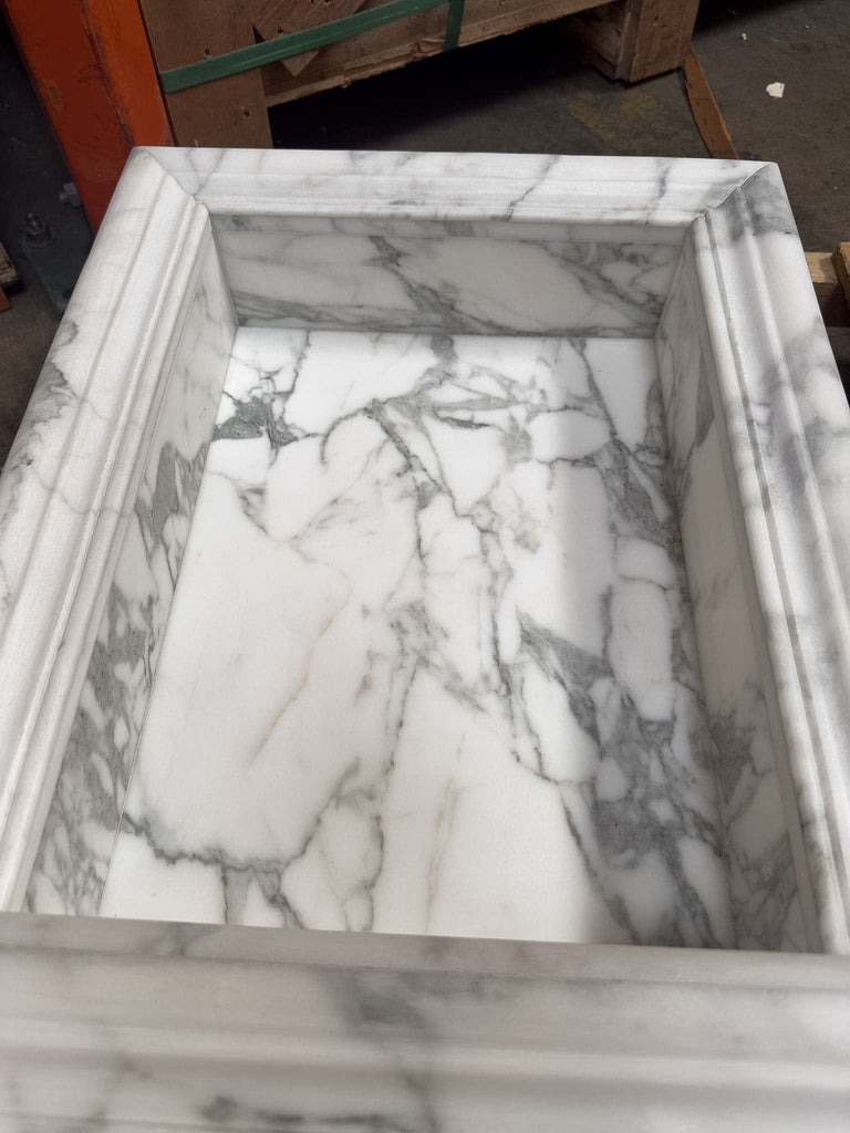 White marble fireplace surround with grey veining for Hand Made Marble Shampoo Niche