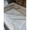 White marble fireplace mantel from the Hand Made Marble Shampoo Niche collection