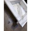 Handmade white marble shampoo niche with elegant classical molding and gray veining
