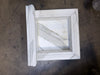 Handmade white marble shampoo niche with carved frame and veined inset