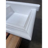 White glossy framed kitchen cabinet door or drawer front in a Handmade Marble Shampoo Niche