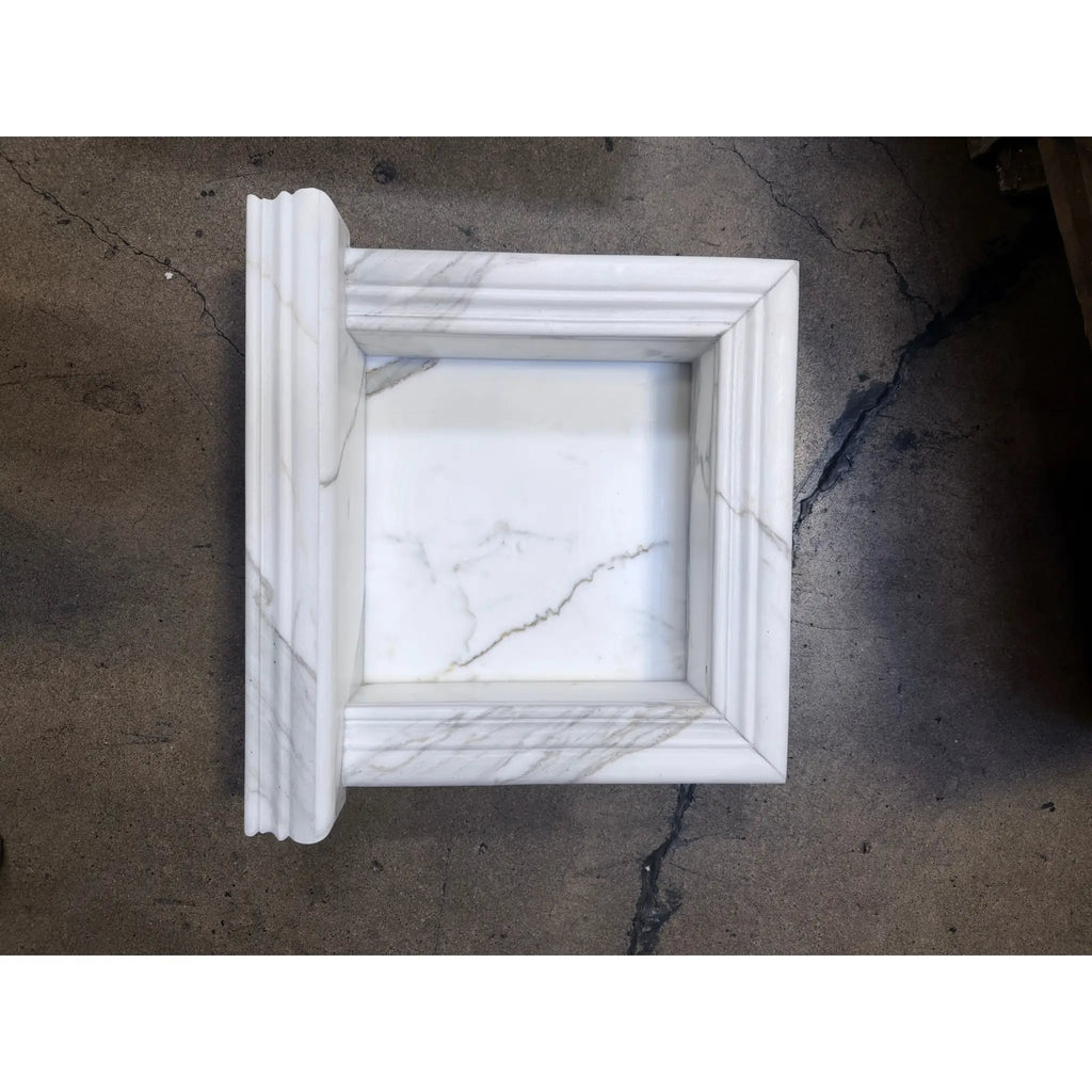 Handmade white marble shampoo niche with elegant classical molding