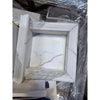 Elegant white marble shampoo niche with classic frame and gray veining
