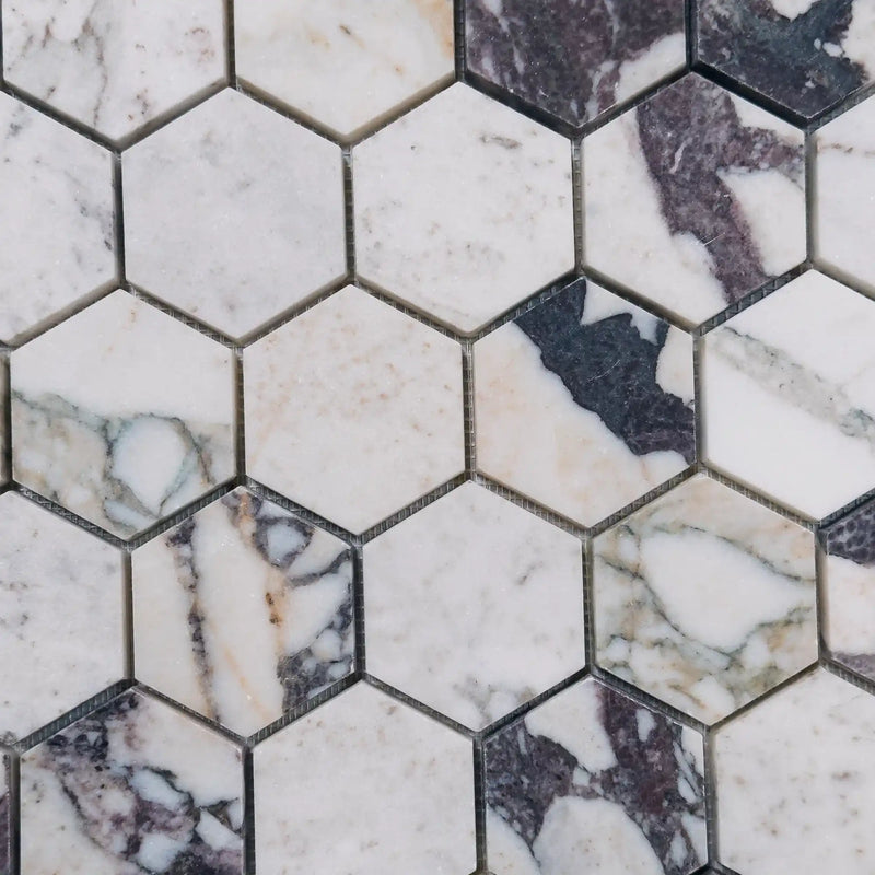 Hexagonal marble mosaic tiles.