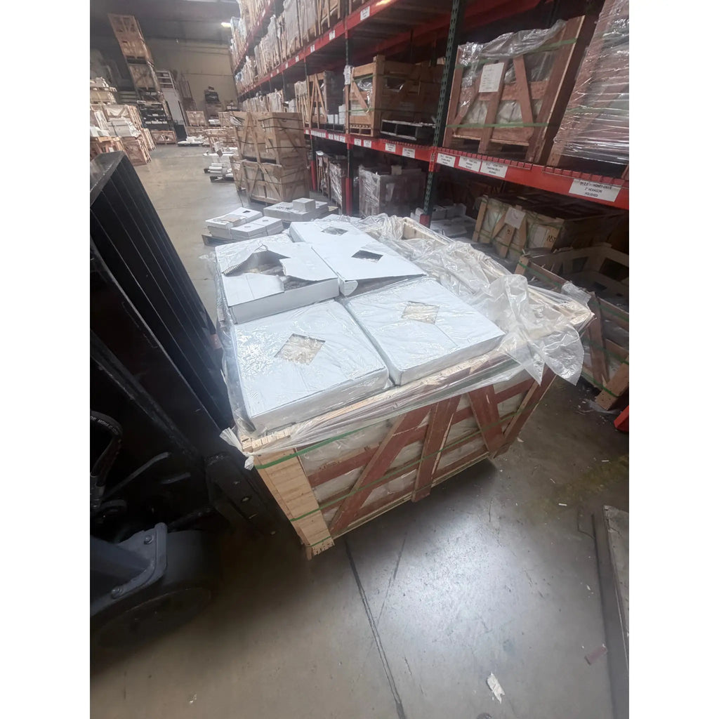 Stacked Honey Onyx Giallo Crystal 1x2 brick mosaic tiles on pallet