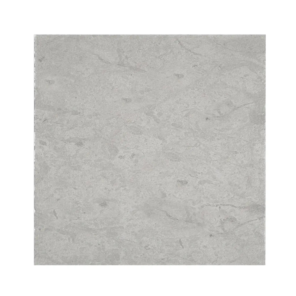 Imperio Grey 12x12 honed limestone tile with light gray stone, subtle veining, and smooth polished surface