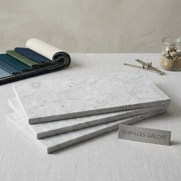 Stack of four imperio grey 12x24 limestone honed tiles with light gray marble effect and subtle veining
