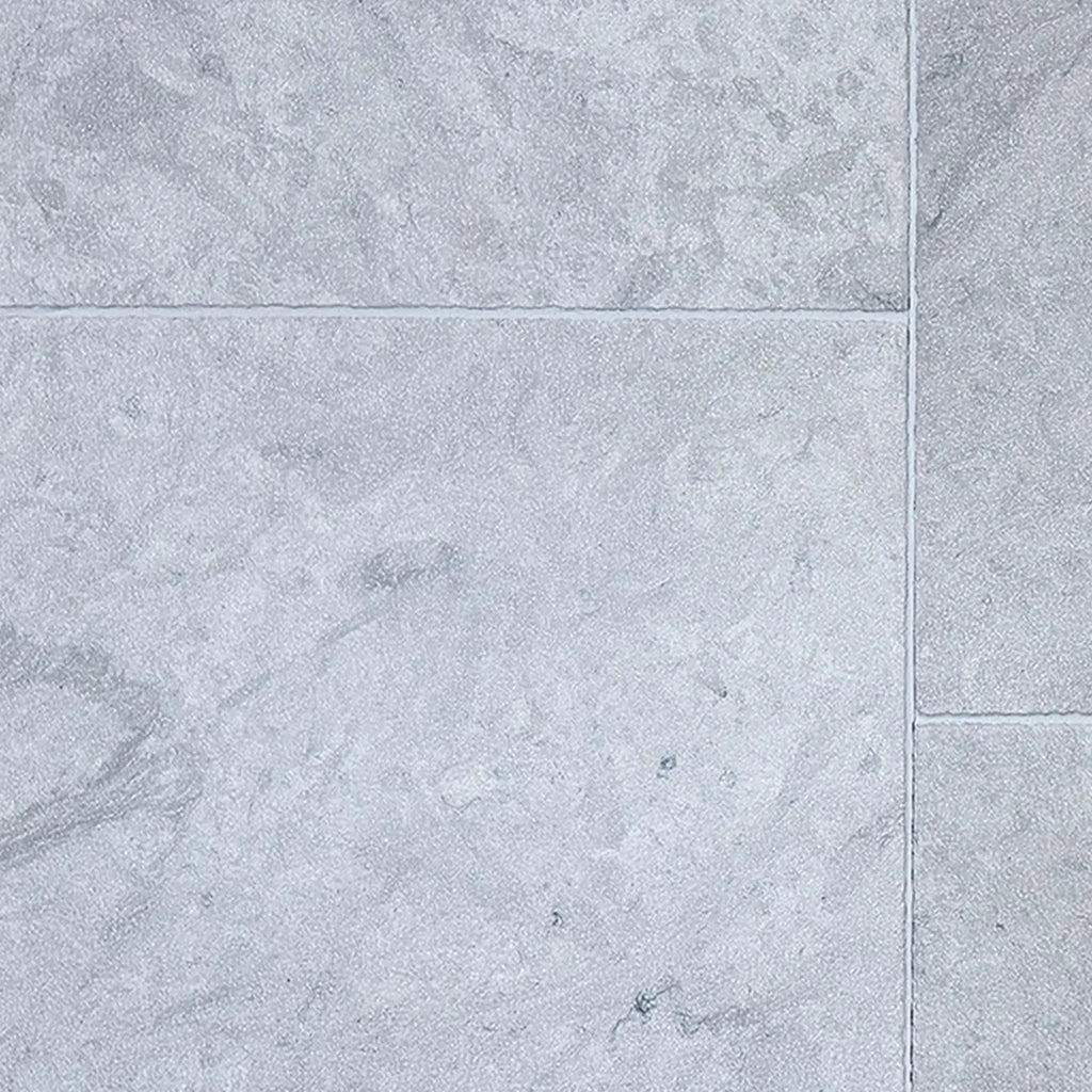 Imperio Grey 16x24 limestone antiqued tiles with gray stone-effect, veining, matte finish