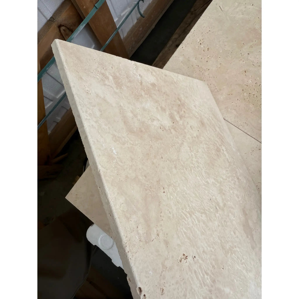 Beige Travertine tile from Ivory Light Travertine 12X12 Cross-Cut Tumbled collection