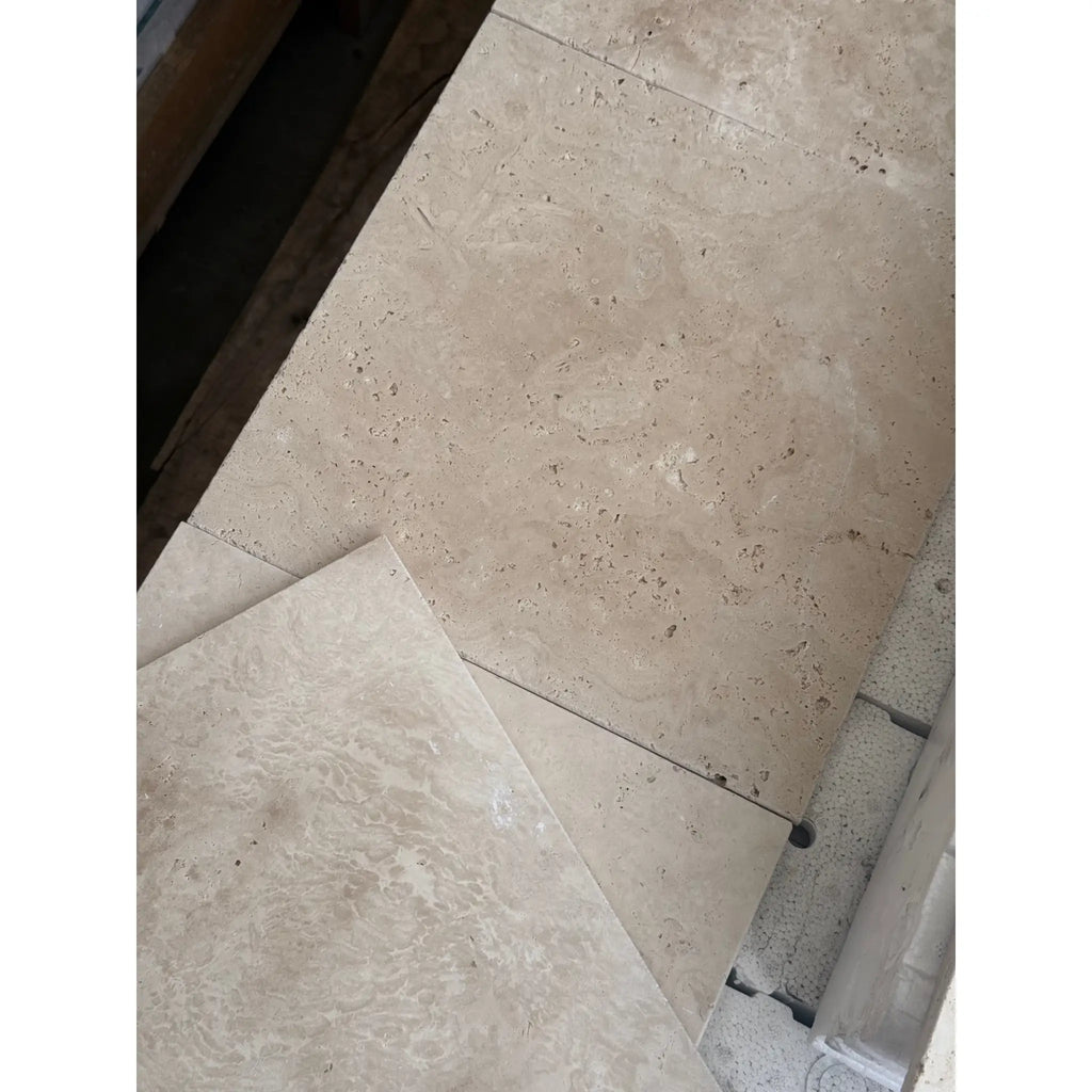 Beige Travertine tiles featured in Ivory Light Travertine 12X12 Cross-Cut Tumbled