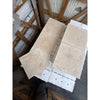 Beige travertine tiles from Ivory Light Travertine 12X12 Cross-Cut Tumbled collection