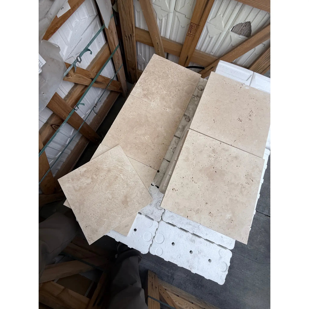 Beige travertine tiles from Ivory Light Travertine 12X12 Cross-Cut Tumbled collection