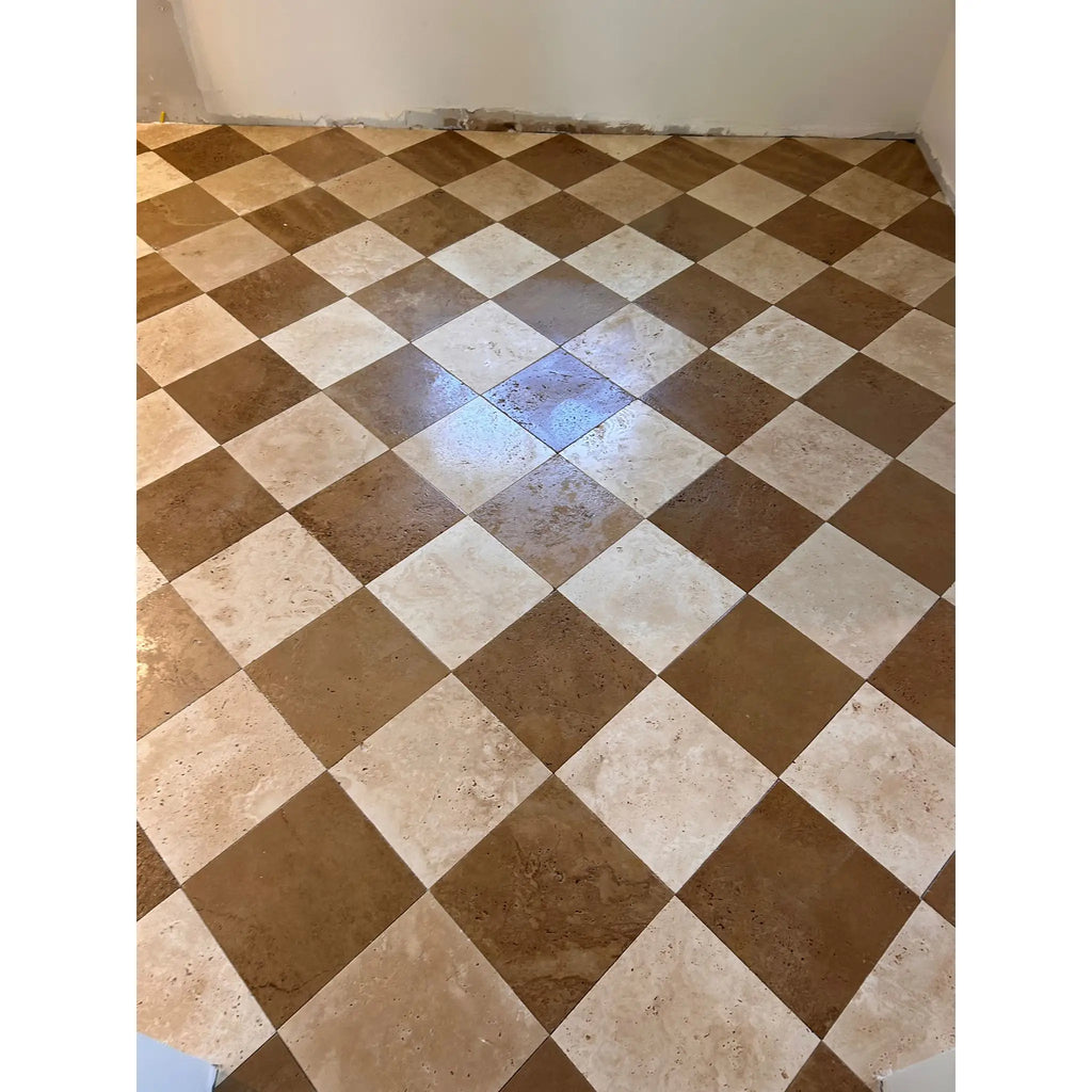 Checkerboard pattern floor tiles from Ivory Travertine 12x12 Cross-Cut Tumbled collection