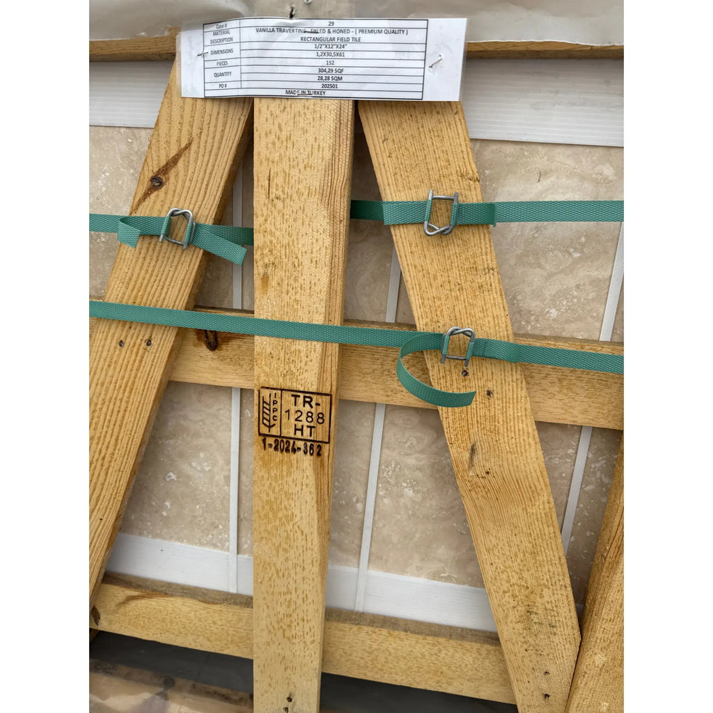 Wooden-framed strapped artwork displayed on Ivory Light Travertine 12x24 tile
