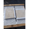 Ivory light travertine 18x18 cross-cut filled honed tiles on pallet
