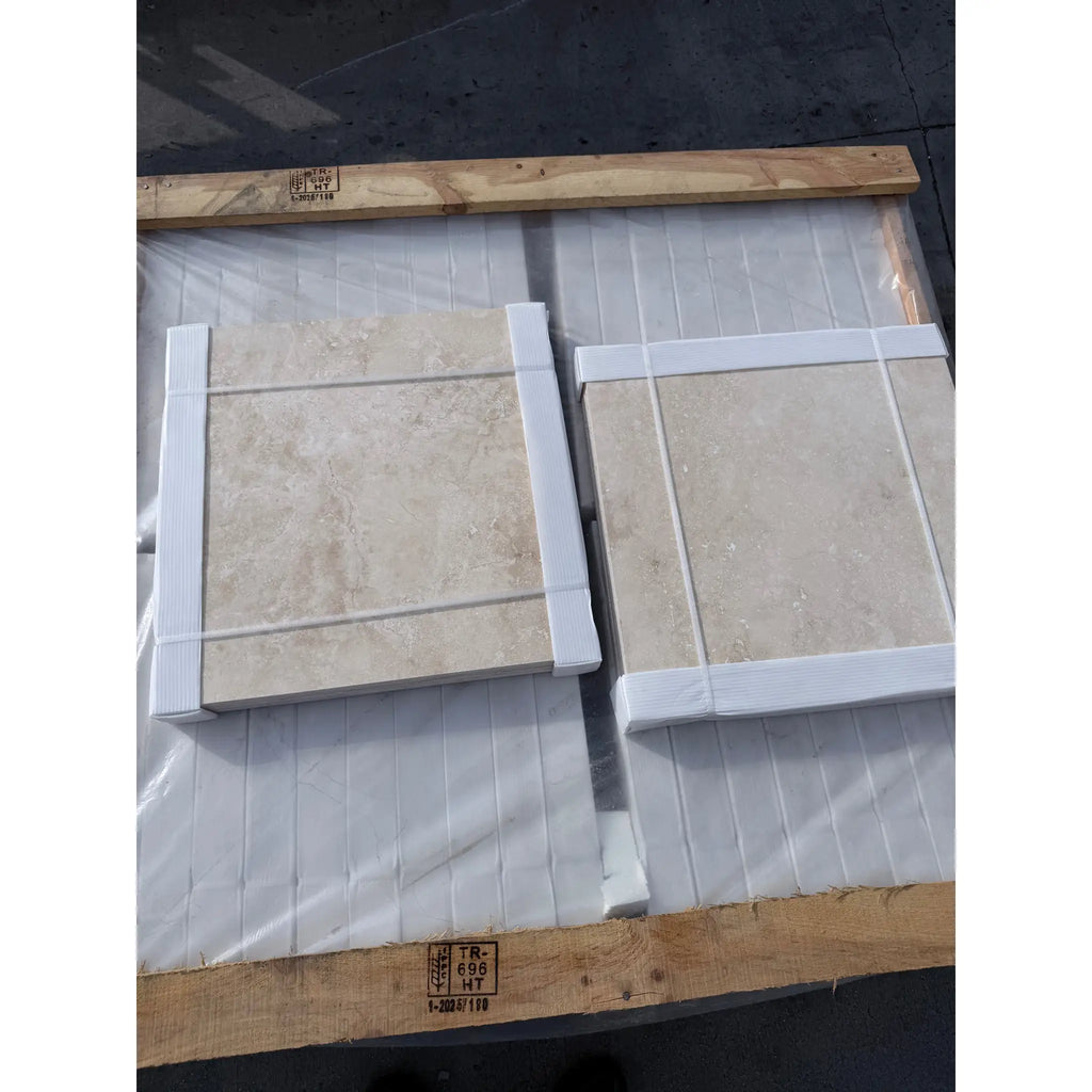 Ivory light travertine 18x18 cross-cut filled polished tiles on pallet