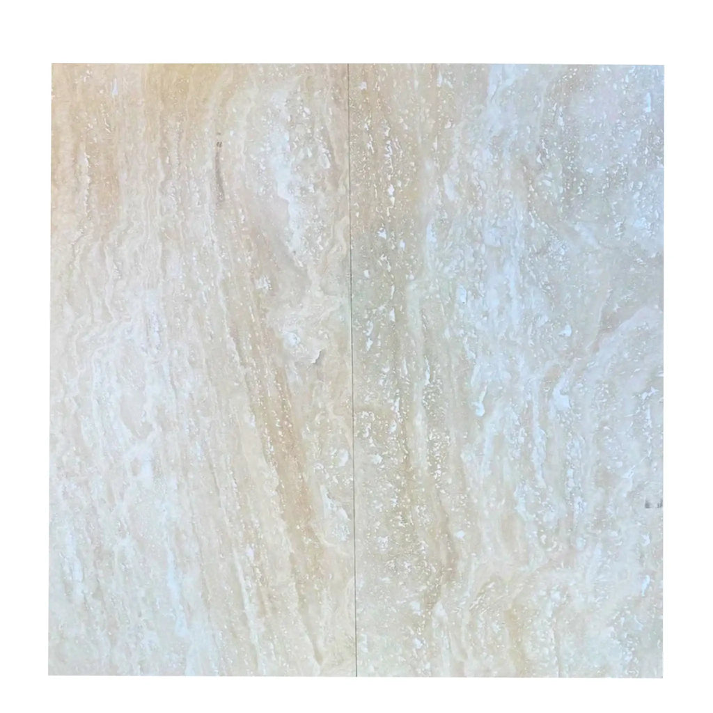 Beige Travertine tile in the Ivory Light Travertine 18X36 Vein-Cut product line