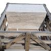 Stacked Ivory Light Travertine 18X36 Vein-Cut tiles in a wooden crate