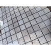 Ivory Light Travertine 1x1 tumbled mosaic tile in light gray with natural veining and matte texture
