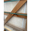 Green strap securing Ivory Travertine 24x24 cross-cut beams