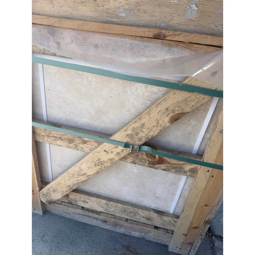 Wooden crate containing Ivory Light Travertine 24x24 cross-cut filled and honed tiles