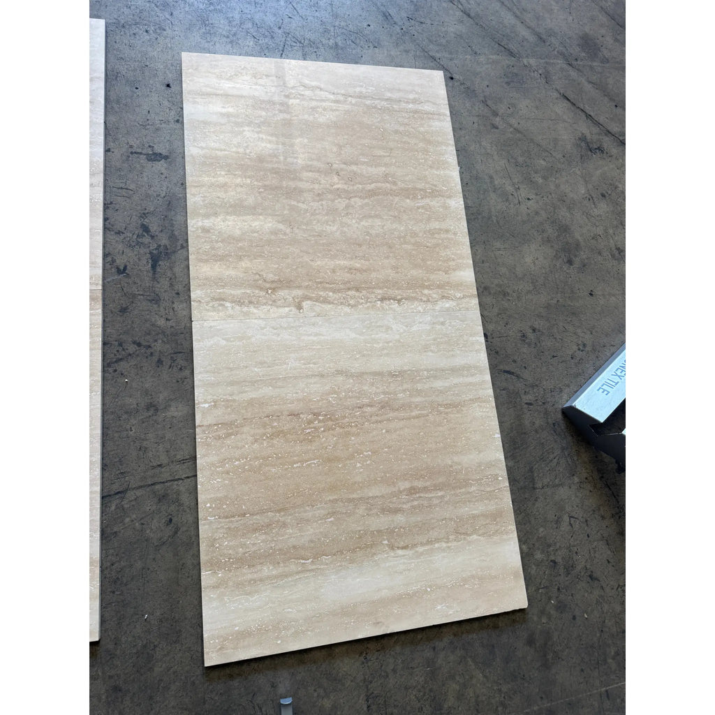Beige marble-effect ivory light travertine tile with natural veining and polished honed finish 24x24 vein-cut