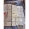 Ivory light travertine 2x2 mosaic tile panel in beige with natural stone texture and subtle veining honed finish