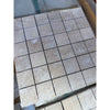 Ivory light travertine 2x2 mosaic filled and honed beige marble tiles with natural veining wrapped in clear plastic