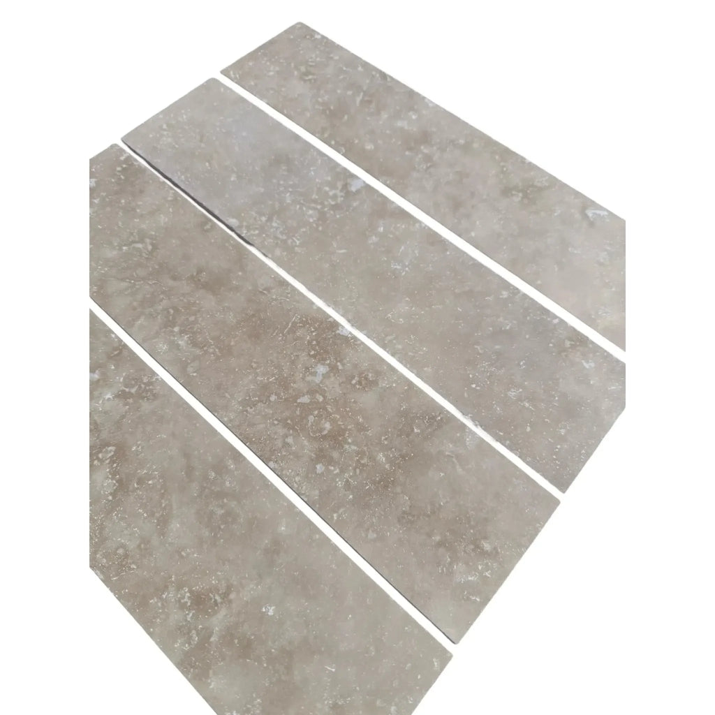 Rectangular gray stone tiles of Ivory Light Travertine 3’’ X 12’’ Field Tile