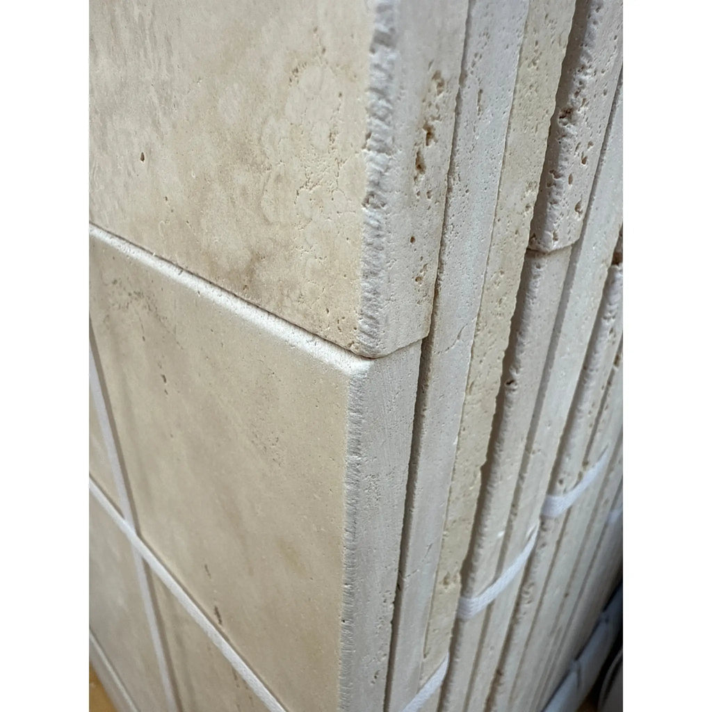 Stacked Ivory Light Travertine tiles in a 4 pcs Versailles French Pattern Set