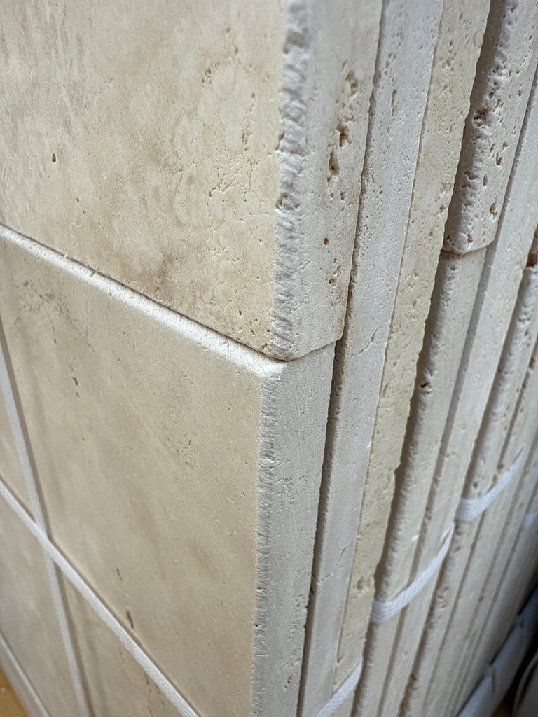 Stacked Ivory Light Travertine tiles in a 4 pcs Versailles French Pattern Set