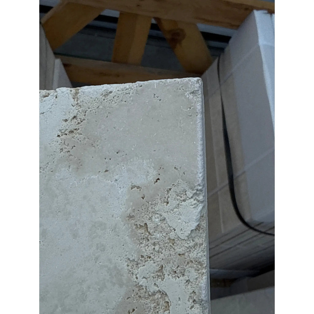 Textured light-colored stone block of Ivory Travertine 4 pcs Versailles Pattern Set