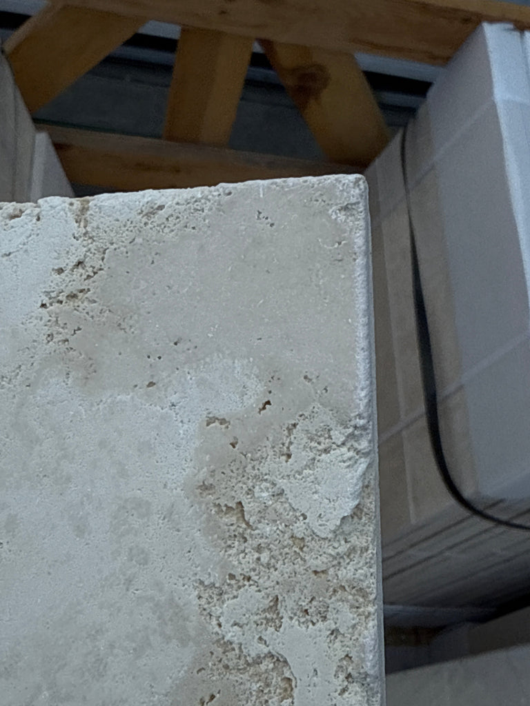 Textured light-colored stone block of Ivory Travertine 4 pcs Versailles Pattern Set