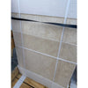 Tiled stone slabs of Ivory Travertine secured with straps in a Versailles pattern set