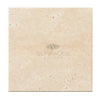 Beige travertine tile displayed in Ivory Light Travertine 4X4 Cross-Cut Tumbled design