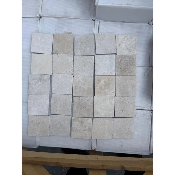 Square travertine tiles in Ivory Light Tumbled 4x4 Cross-Cut finish
