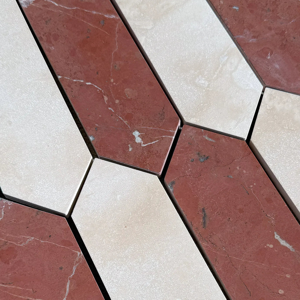 Alternating red and white marble tiles in Ivory Travertine and Nero Marquina Mosaic