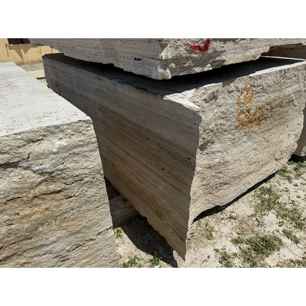 Legno D’Argento Striato Roman Silver Travertine 12x12 vein-cut tile with stacked light beige slabs, natural striations, and rough edges