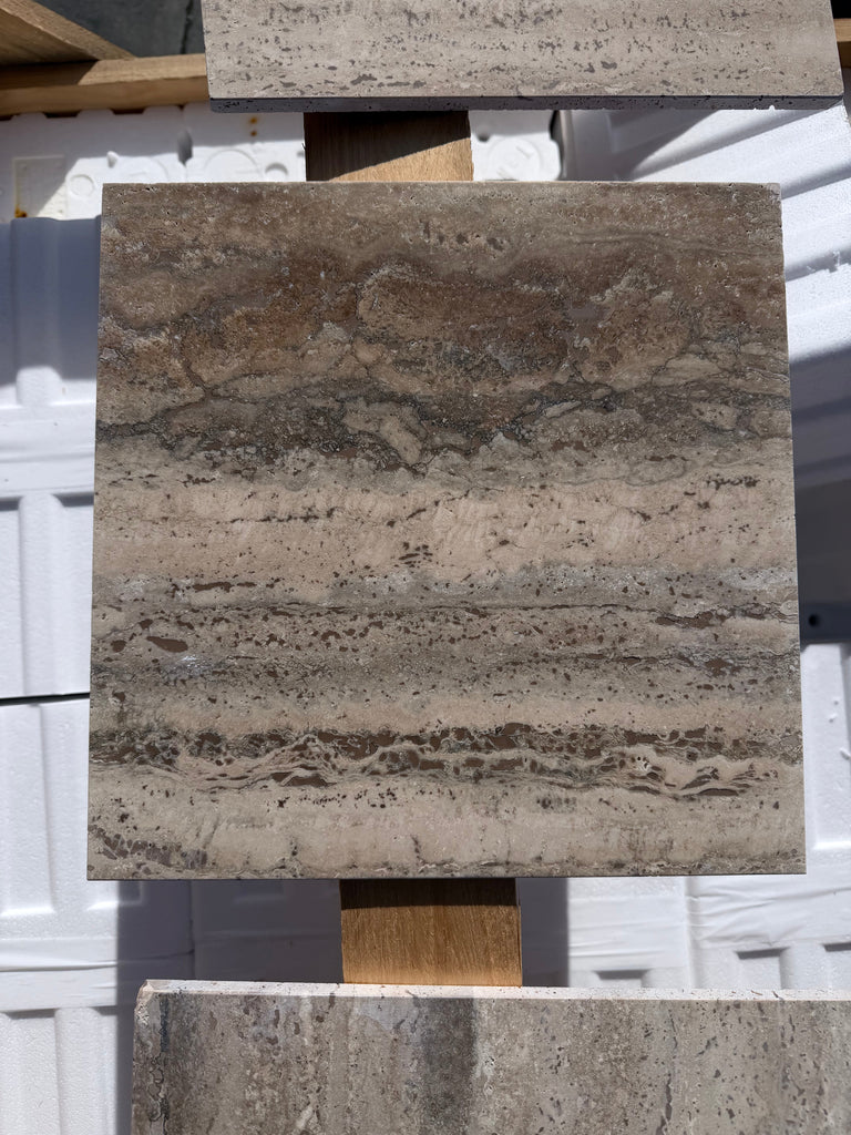 Square beige and brown Legno D’Argento Striato Roman Silver Travertine 12x12 vein-cut tile with natural veining