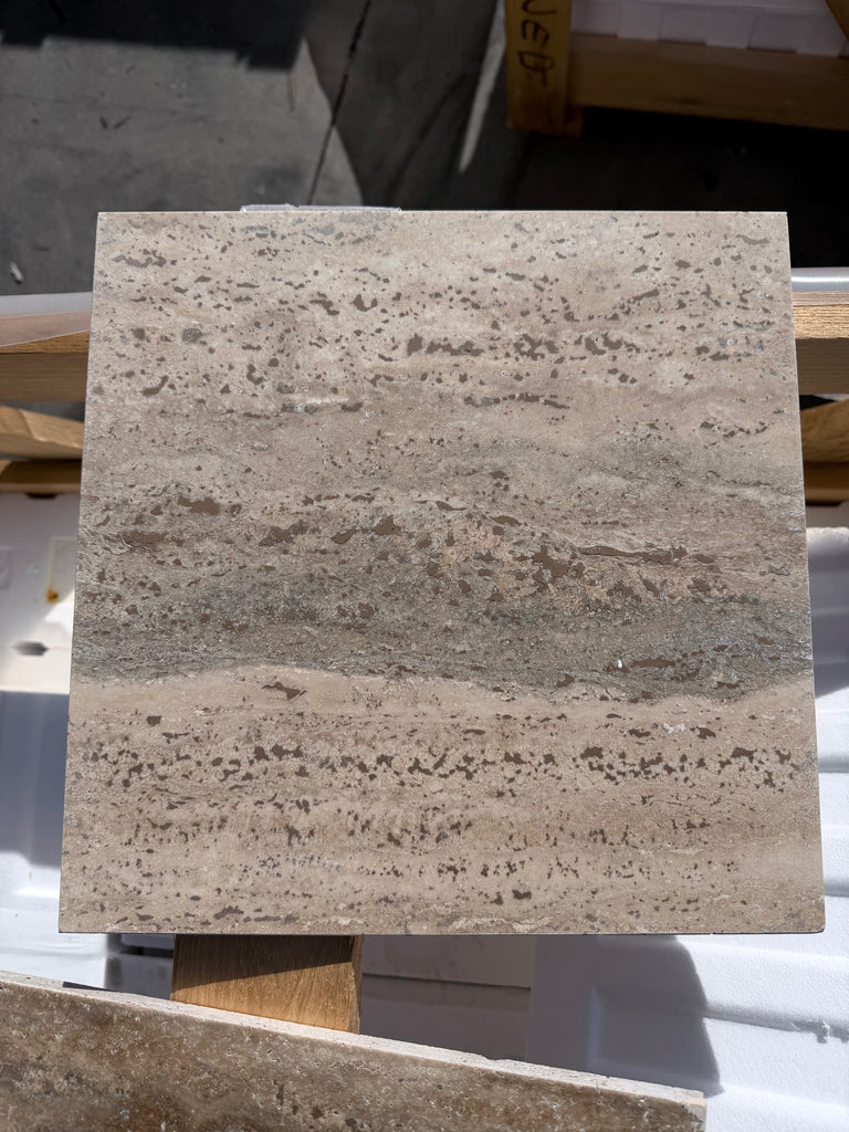 Legno D’Argento Striato Roman Silver Travertine 12x12 vein-cut tile with beige and gray stone veining