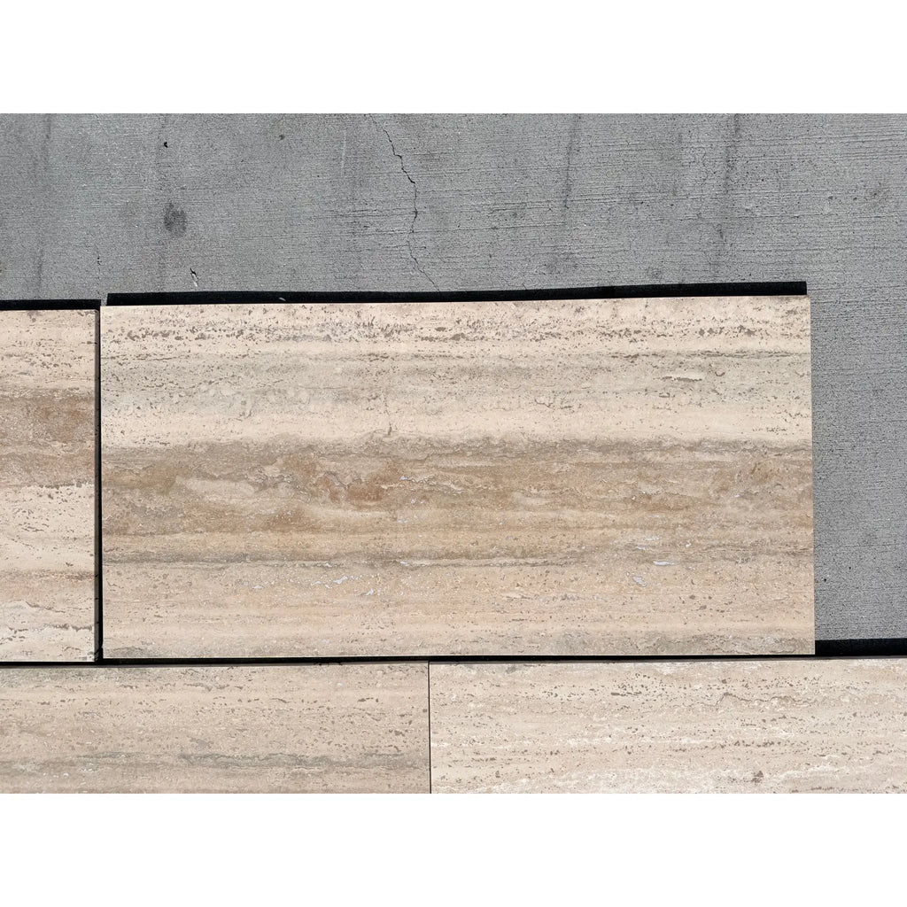 Beige and tan striped Legno D’Argento Striato travertine 12x24 tile