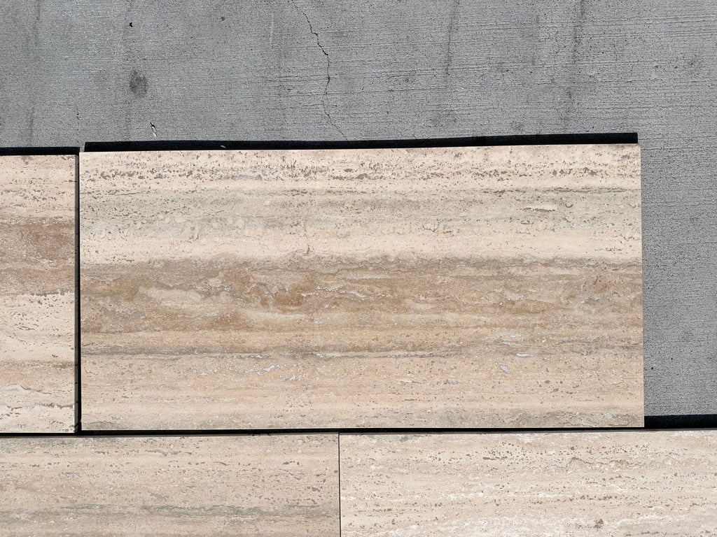 Beige and tan striped Legno D’Argento Striato travertine 12x24 tile