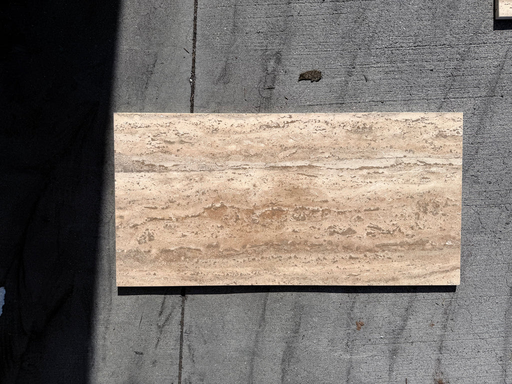 Legno D’Argento Striato Roman Silver Travertine 12x24 vein-cut tile with beige natural stone veining and polished surface