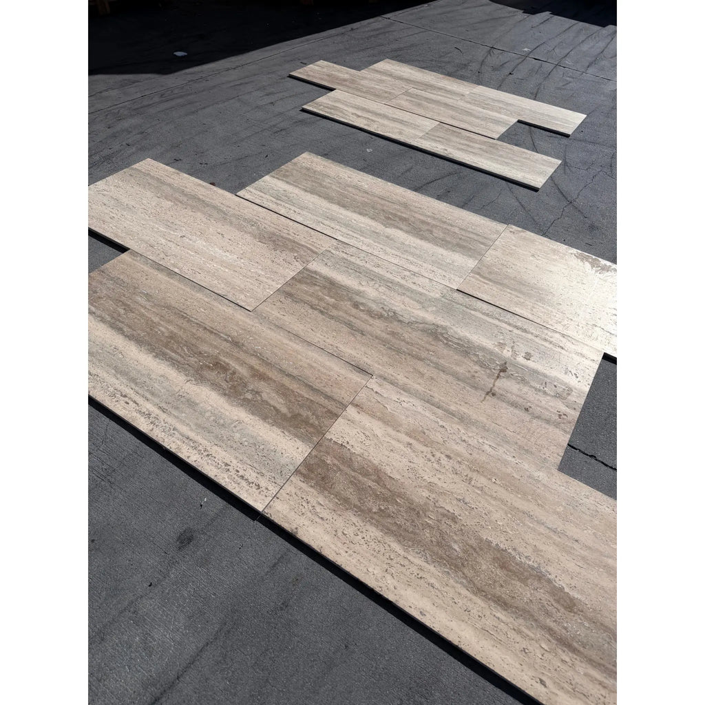 Beige and tan Roman Silver Travertine 12x24 vein-cut floor tiles with textured surface