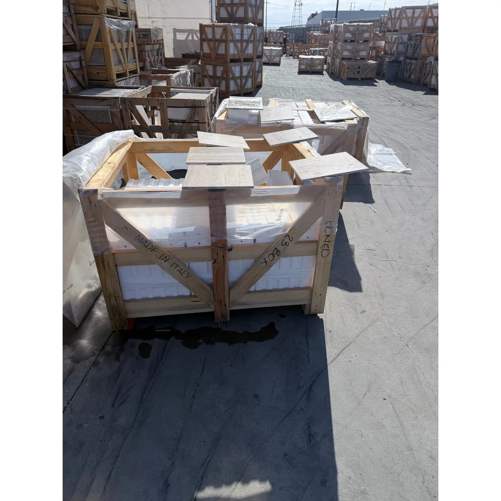 Wooden crate of Italian Roman Silver Travertine 18x36 vein-cut tiles, labeled 7085x