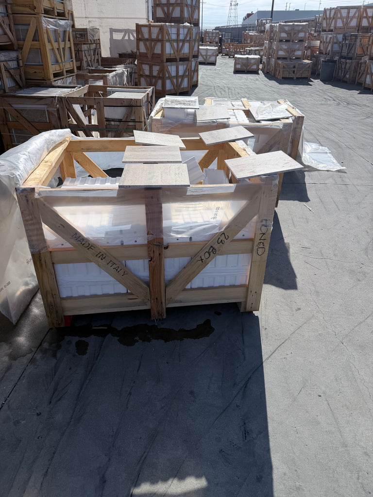 Wooden crate of Italian Roman Silver Travertine 18x36 vein-cut tiles, labeled 7085x